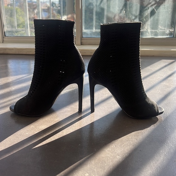 3 in heels. Stretch toe free booties. Nice stretch but retain its natural shape. - Picture 2 of 5